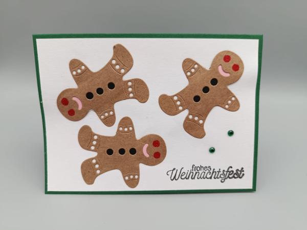 Frohes Weihnachtsfest Grußkarte mit Lebkuchenmännern